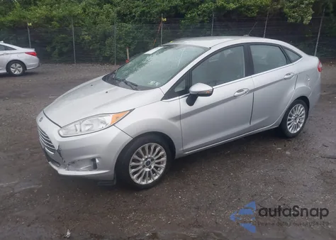 2014 Ford Fiesta Titanium z USA, uszkodzony, nr VIN 3FADP4CJ1EM206947